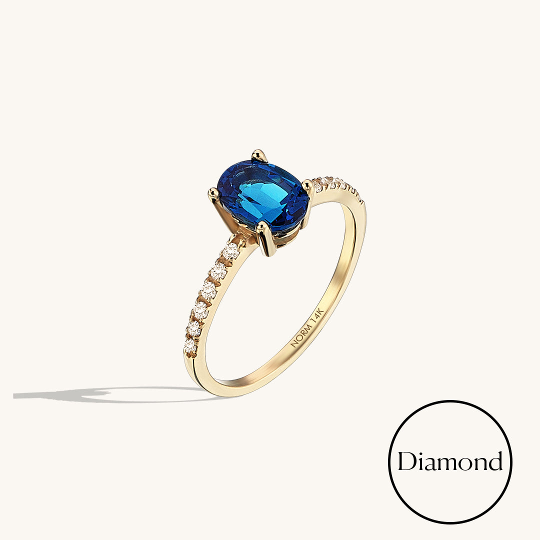 Oval Sapphire and Diamond Solitaire Ring in Gold
