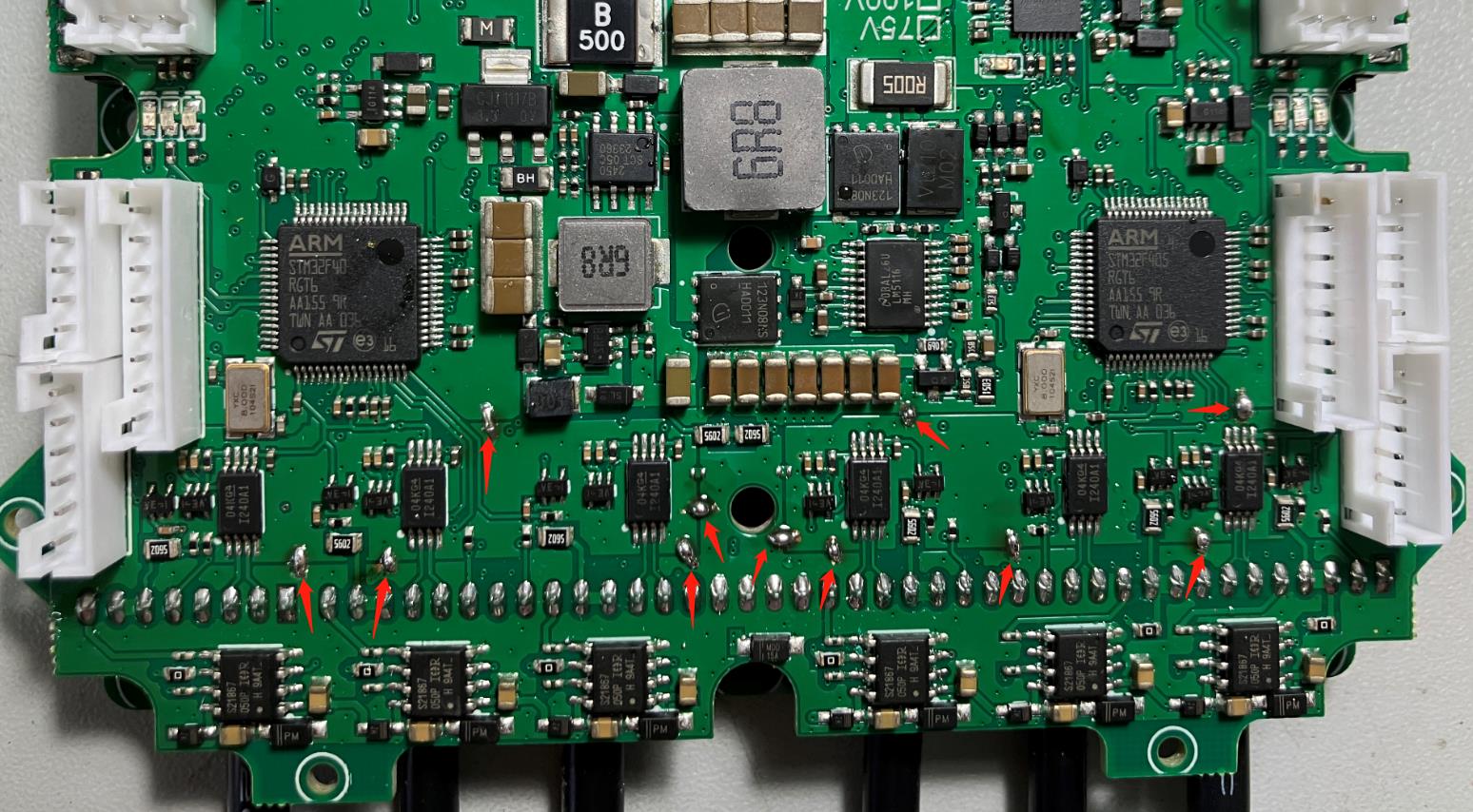 Merge the two grounds with the solder