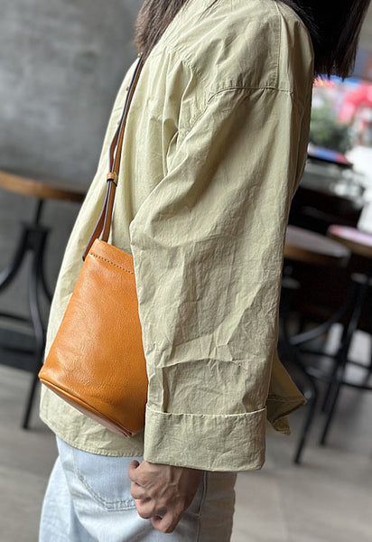 台灣李記皮具 李記 原創真皮手工                            韓版ハ精緻簡約で迷你水桶包23015號原創手工真皮 皮件