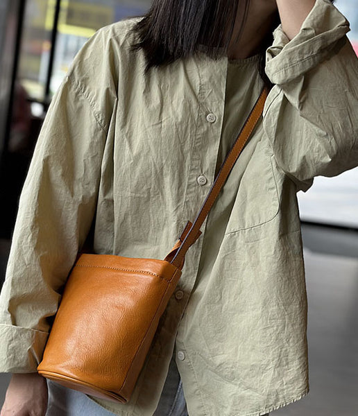 台灣李記皮具 李記 原創真皮手工                            韓版ハ精緻簡約で迷你水桶包23015號原創手工真皮 皮件