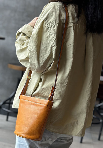 台灣李記皮具 李記 原創真皮手工                            韓版ハ精緻簡約で迷你水桶包23015號原創手工真皮 皮件