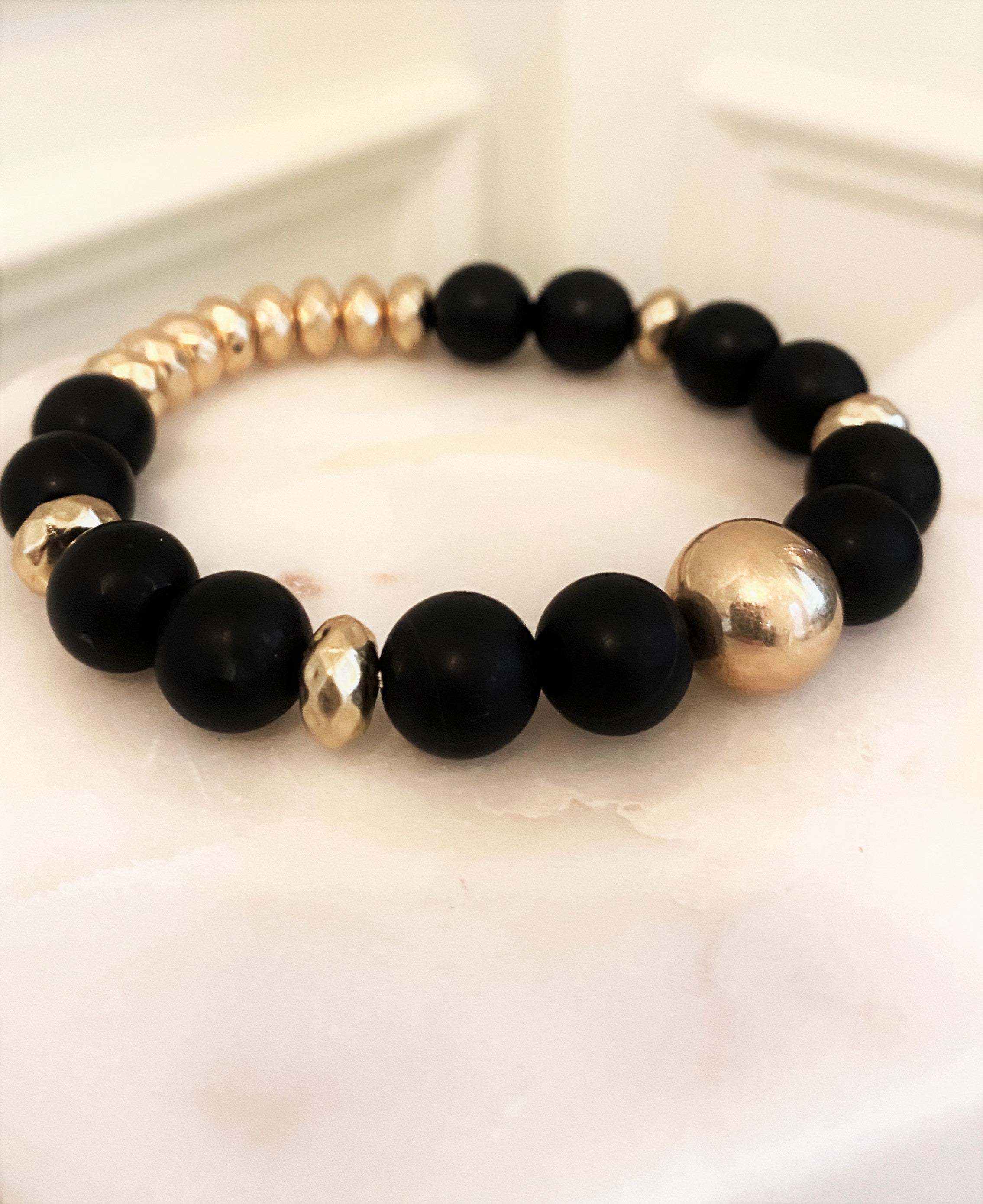 Jewelry -Stretch black and gold bead bracelet