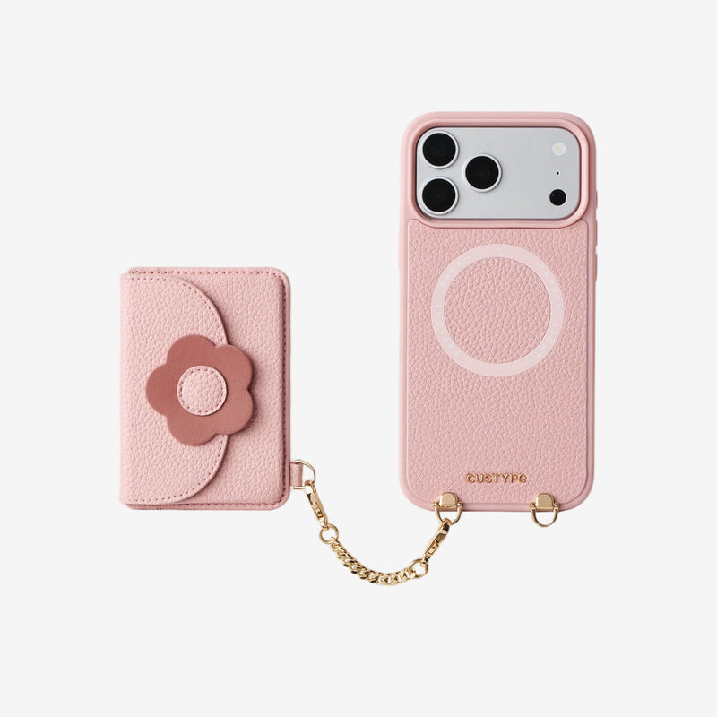 Pink floral phone case with chain and flower detail 