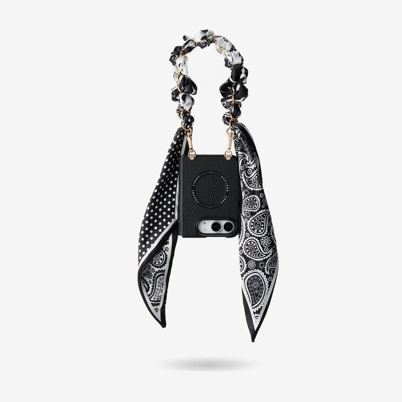 iPhone DUO MagSafe case with black leather finish and detachable scarf strap for stylish everyday carry