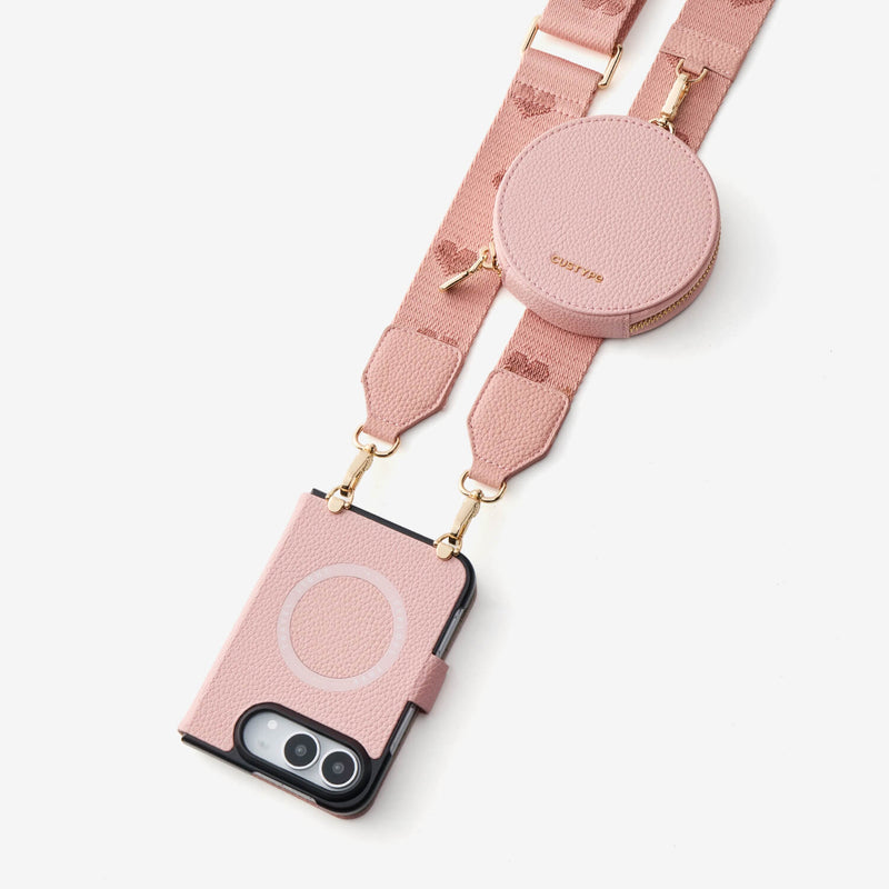 Charming pink iPhone DUO case with leather texture and coordinated crossbody accessories