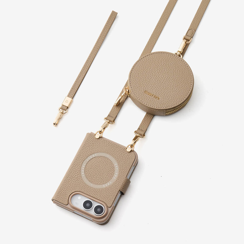 Taupe leather iPhone 18 Duo folio case with a matching round zip pouch and adjustable strap