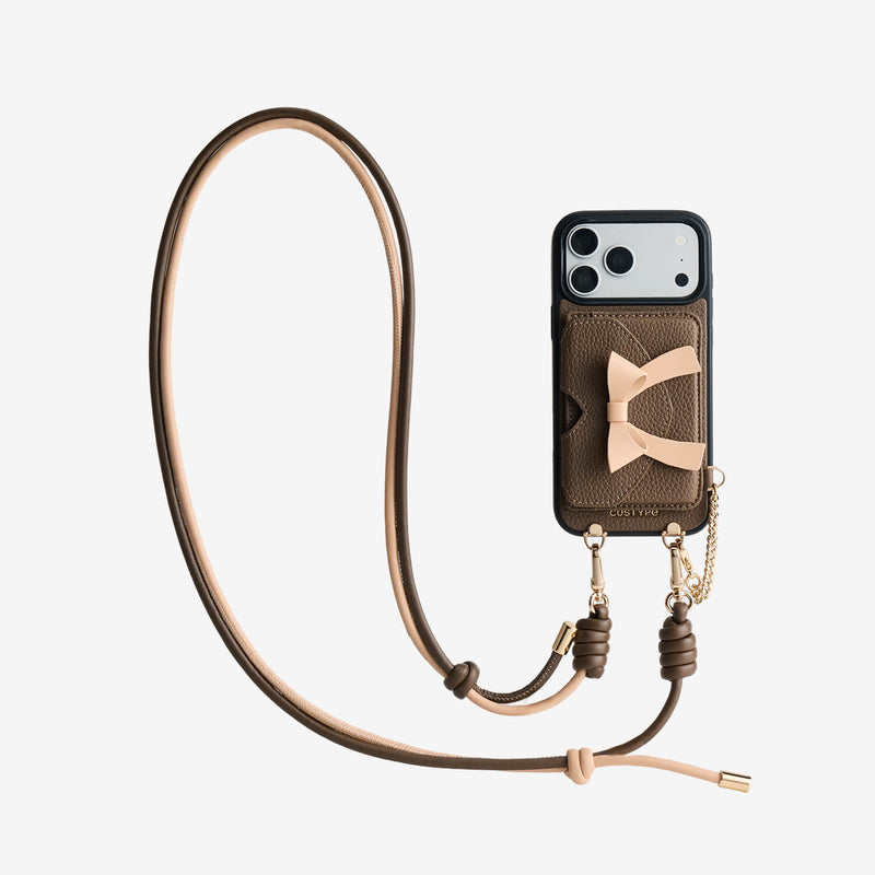 Mocha iPhone 18 Pro MagSafe case featuring detachable bow card storage wallet and adjustable crossbody strap for everyday carry