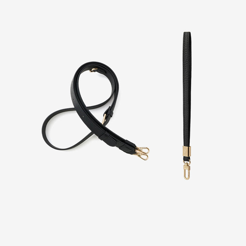 Black leather crossbody strap and wrist strap with gold hardware 