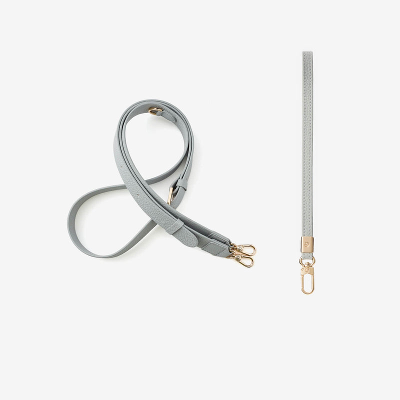Gray detachable crossbody strap and wristlet with gold hardware 