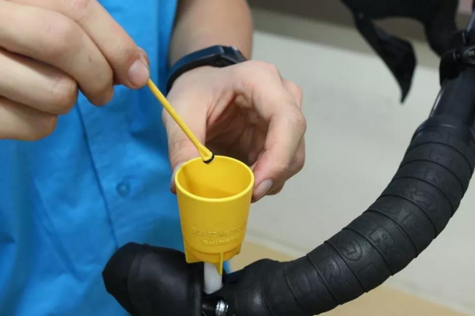 Remove the oil cup stopper