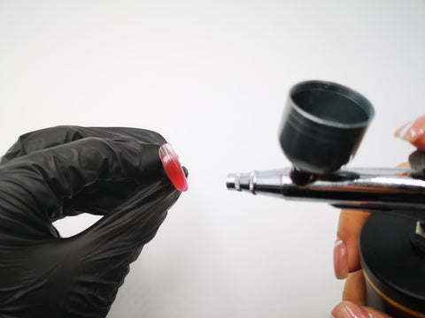 Step 3: Start Airbrushing Spray a thin layer of nail gel polish with Airbrush and cure under nail lamp for 30-60 seconds. Repeat for multiple layers if needed.