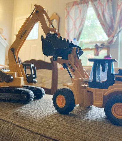 Construction pull back vehicle