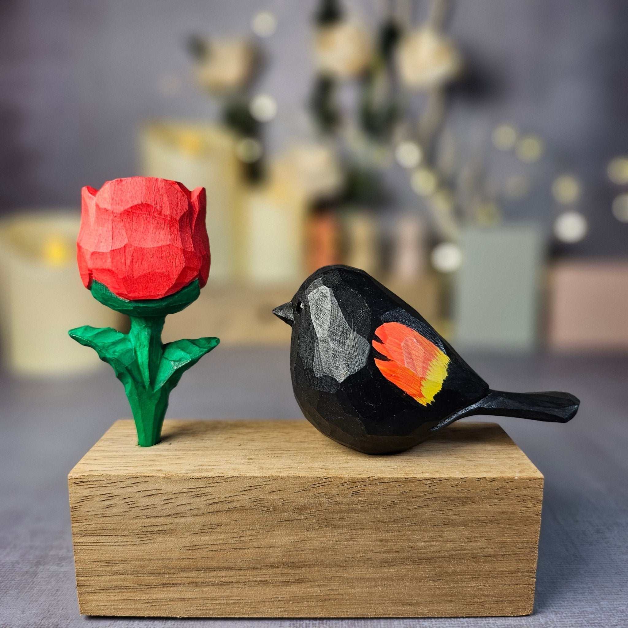 Red-winged Blackbird with Rose