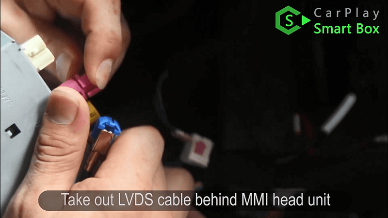 4.Take out LVDS cable behind MMI head unit.