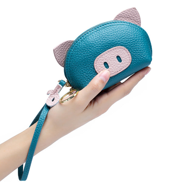 himoda cute leather coin pouch-piggy- blue in hand