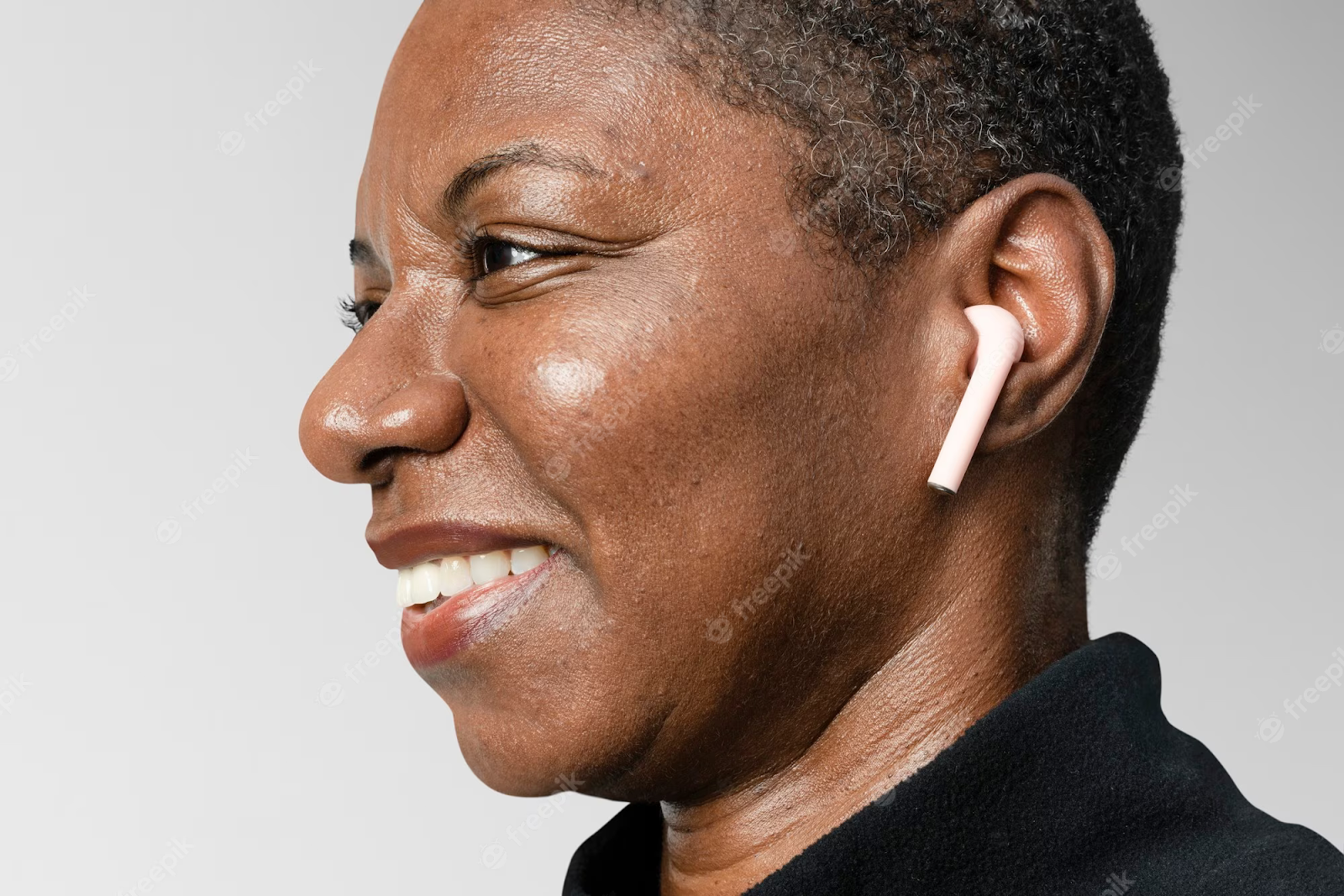 Woman wearing earbuds
