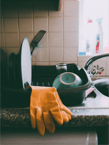 yellow-latex-gloves-on-dish-rack