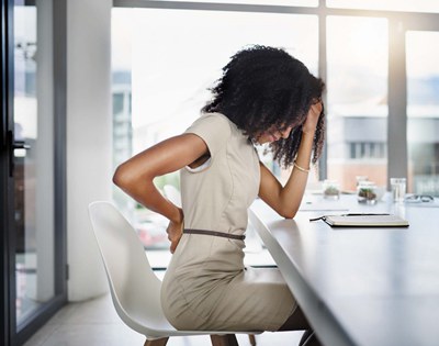 back pain while sitting down