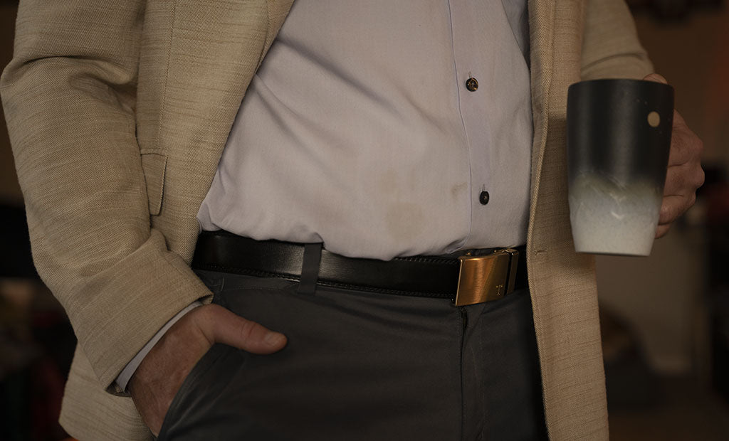 men hold coffee with tonywell gold belts on