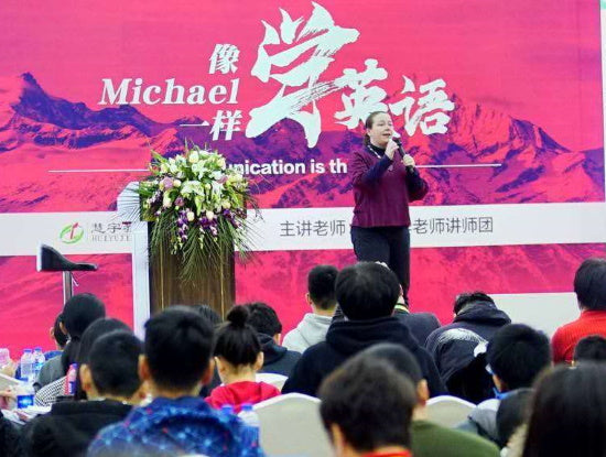 Doing English training on stage in Beijing
