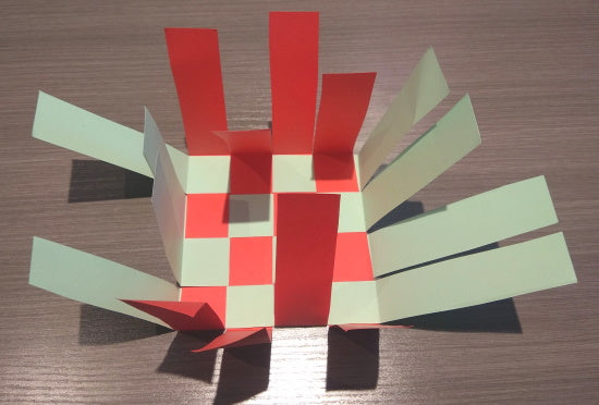 Side strips of basket all folded up