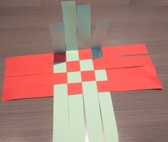 Folding the side strips up at a 90-degree angle