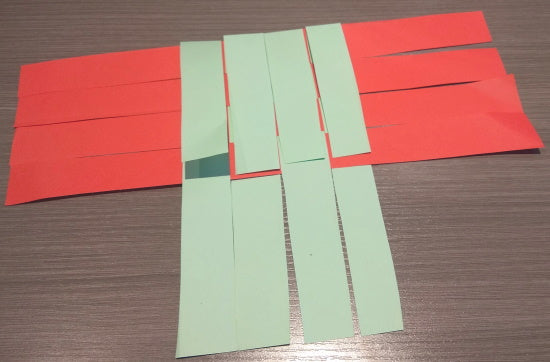 Folding the side strips to the center