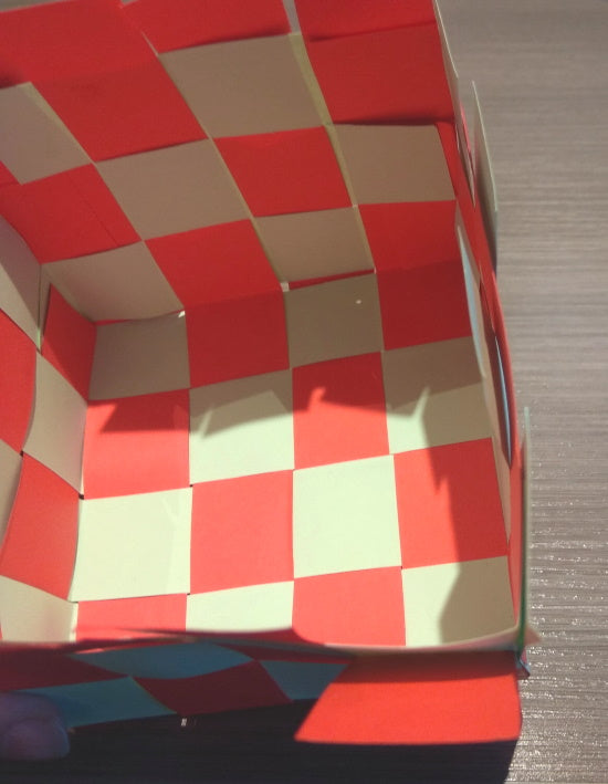 Loose ends at the top edge of the basket