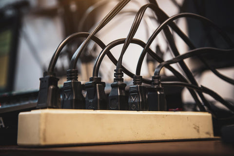 old-damaged-electric-adapter-power-plug-has-many-appliances-are-plugged-outlet-socket