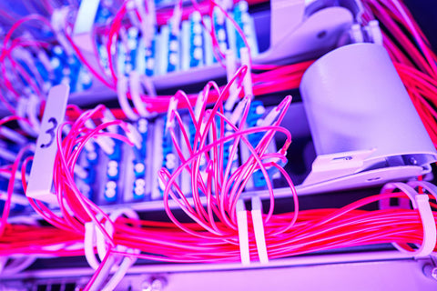 red-fiber-optic-cables-tied-together-with-zip-ties-with-connections-network-switches