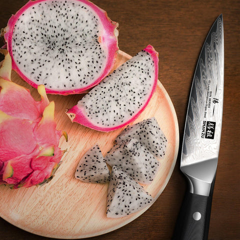 Cut the dragon fruit into small pieces with a shan zu sun series 8 inch chef's knife