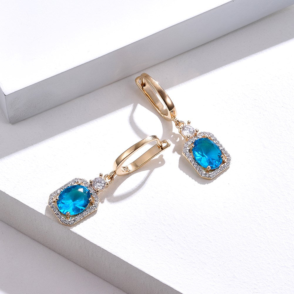 SKMEI KZCE303 Pendientes azules con diamantes para niñas