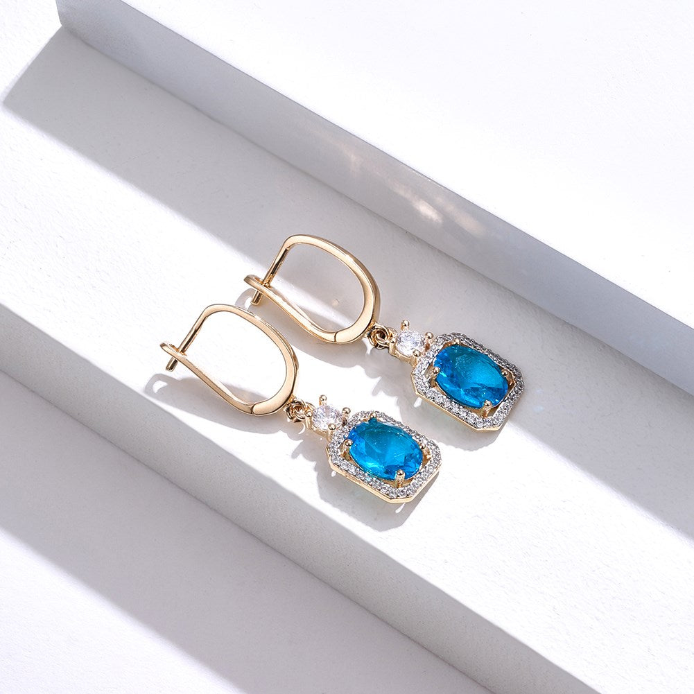 SKMEI KZCE303 Pendientes azules con diamantes para niñas