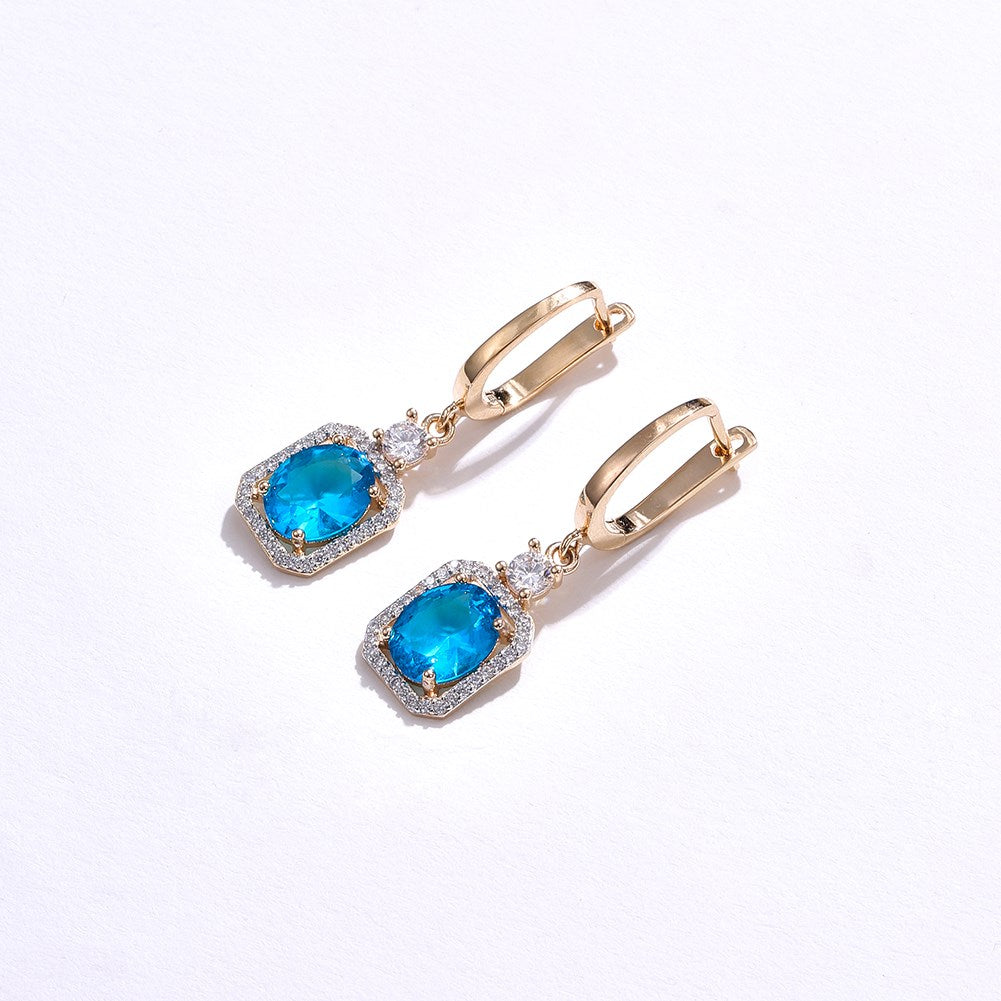 SKMEI KZCE303 Pendientes azules con diamantes para niñas