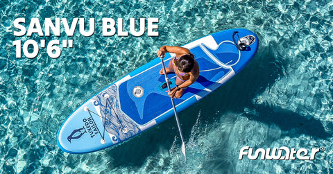 A man who is paddleboarding on the water