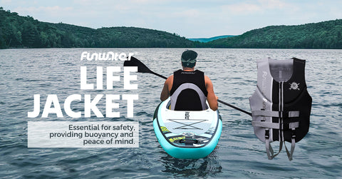 A man who is wearing life jacket paddleboarding