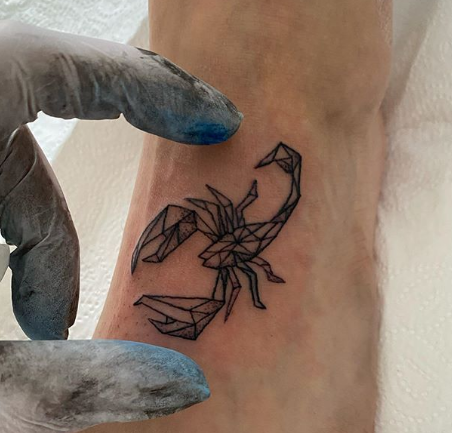 scorpion foot tattoo design