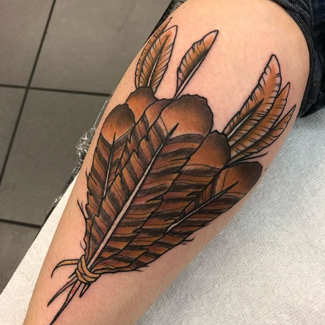 Tattoo uploaded by Janet Thatcher  Red tailed black cockatoo feather  feather feathertattoo colourrealism  Tattoodo