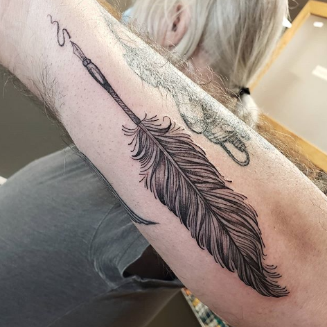quill pen feather tattoo