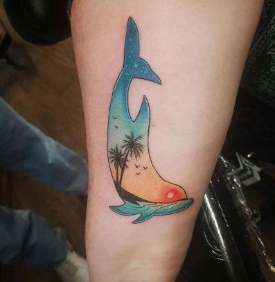 dolphin beach double exposure tattoo