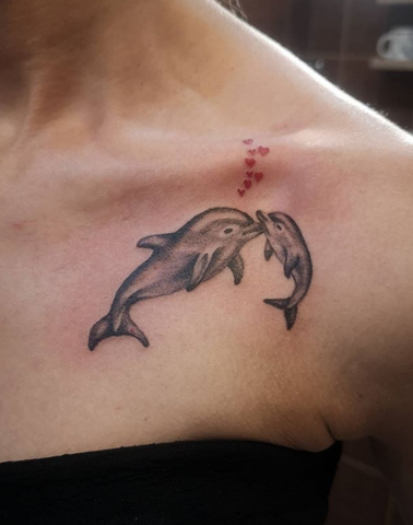 mom and baby dolphin tattoo