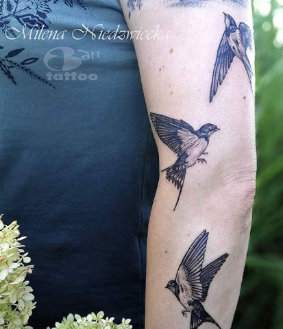 swallow arm tattoo