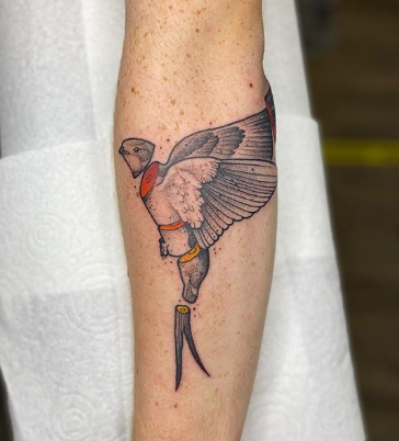 dismembermented swallow tattoo