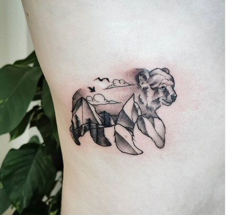 mountain nature in a bear frame double exposure