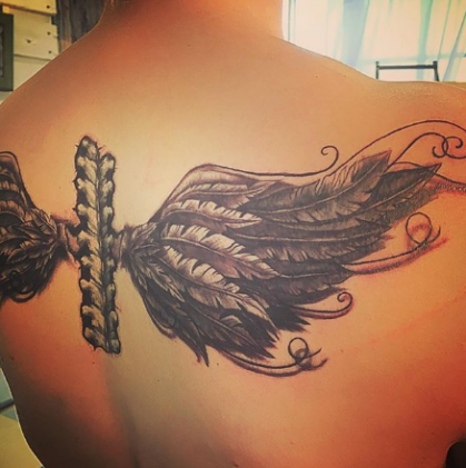 Phoenix Wing Tattoo on the back