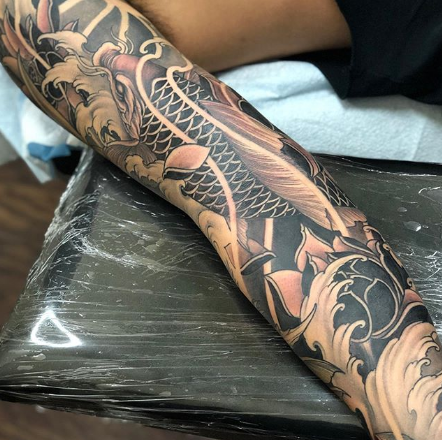 Lotus and Koi Fish Tattoo