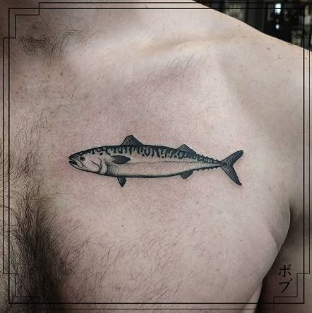 fish tattoo on the chest