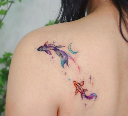 fish tattoo on the shoulder
