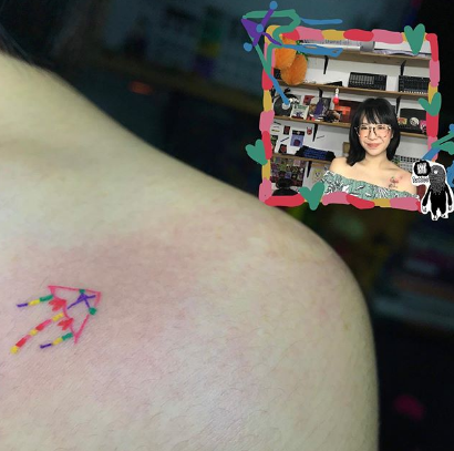 colored kite tattoo on the shoulder
