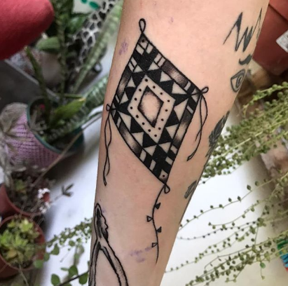 diamond kite tattoo